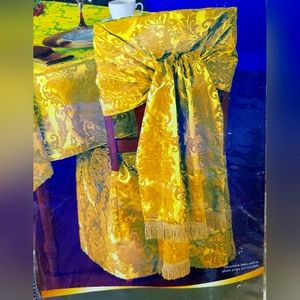 4 Golden ELEGANT  sets of Chair covers. Look at last 2 pictures.